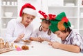 Happy decorating gingerbread cookies