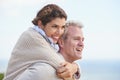 Happy and deeply in love. Portrait of a loving mature couple embracing and smiling happily. Royalty Free Stock Photo