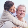 Happy and deeply in love. Portrait of a loving mature couple embracing and smiling happily. Royalty Free Stock Photo