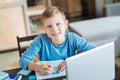 Happy delighted boy studying Royalty Free Stock Photo