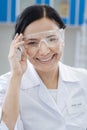 Happy delighted chemist wearing a labcoat