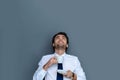 Happy delighted man enjoying his drink Royalty Free Stock Photo