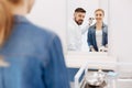 Happy delighted woman looking at her reflection Royalty Free Stock Photo