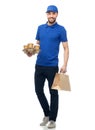 Happy delivery man with coffee and food in bag Royalty Free Stock Photo