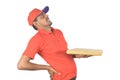 Happy delivery man holding courier with back pain in uniform Royalty Free Stock Photo