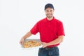 Happy delivery man holding fresh pizza Royalty Free Stock Photo