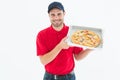 Happy delivery man showing fresh pizza Royalty Free Stock Photo