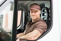 Happy Delivery Man Sitting Inside Van Royalty Free Stock Photo