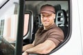 Happy Delivery Man Sitting Inside Van Royalty Free Stock Photo