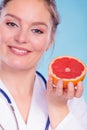 Happy dietitian nutritionist with grapefruit