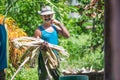 Happy and diligent Cuban senior farmer and groom man capture portrait in old poor countryside, Cuba, America.