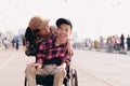 Happy disability kid travel in family holiday concept