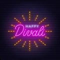 Happy Divali neon lettering on brick wall background.