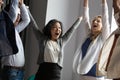 Happy diverse business people celebrating success, screaming with joy Royalty Free Stock Photo