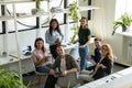 Happy diverse colleagues discuss ideas at briefing Royalty Free Stock Photo