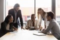 Happy diverse colleagues have fun brainstorming at office meeting Royalty Free Stock Photo