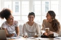 Happy diverse girls having fun, studying together at home Royalty Free Stock Photo