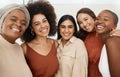 Happy diverse group of young female friends taking a selfie together. Team of cheerful and joyful businesswomen smiling Royalty Free Stock Photo