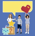 Happy diverse kids with pixilated gaming icons Royalty Free Stock Photo