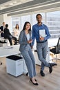 Happy diverse office workers standing in meeting room, vertical portrait. Royalty Free Stock Photo