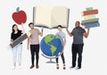 Happy diverse people holding educational icons Royalty Free Stock Photo