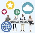 Happy diverse people holding social media icons Royalty Free Stock Photo
