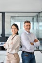 Happy diverse professional business man and business woman in office, portrait. Royalty Free Stock Photo