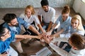 Happy diverse success business team celebrating success and having fun all together. Royalty Free Stock Photo