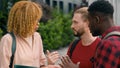 Happy diversity multiracial students diverse multiethnic friends two men and African American woman girl Caucasian guys Royalty Free Stock Photo