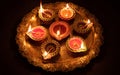 Diwali, Hindu festival of lights celebration. Diya oil lamps against dark background Royalty Free Stock Photo