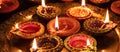 Diwali, Hindu festival of lights celebration. Diya oil lamps against dark background Royalty Free Stock Photo