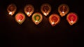 Diwali, Hindu festival of lights celebration. Diya oil lamps against dark background Royalty Free Stock Photo