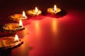 Happy Diwali - Clay Diya lamps lit during Dipavali Royalty Free Stock Photo