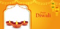Happy Diwali decorated diya lamp on light festival of India greeting background