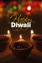 Happy diwali - diwali greeting card with illuminated diya