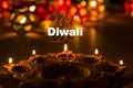 Happy diwali - diwali greeting card with illuminated diya