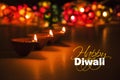 Happy diwali - diwali greeting card with illuminated diya