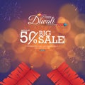 Happy Diwali Sale banner or poster design with firecrackers, 50% discount offer on blurred bokeh background Royalty Free Stock Photo