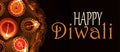 Diwali, Hindu festival of lights celebration. Diya oil lamps against dark background Royalty Free Stock Photo