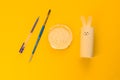 Happy DIY Easter decoration concept bunnies from toilet paper roll tube. Simple creative idea, easy crafts for kids. Eco
