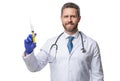 Happy doctor holding medical syringe. Surgeon prepared injection syringe Royalty Free Stock Photo