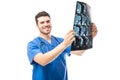 Happy doctor looking at x-rays Royalty Free Stock Photo