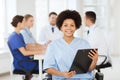 Happy doctor over group of medics at hospital Royalty Free Stock Photo