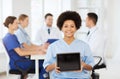 Happy doctor over group of medics at hospital Royalty Free Stock Photo