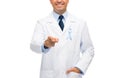 Happy doctor with prostate cancer awareness ribbon Royalty Free Stock Photo