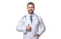 happy doctor with stethoscope. doctor isolated on white. medical doctor man with thumb up Royalty Free Stock Photo