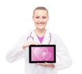 Happy doctor with a tablet and hearts on it. Child expectance an Royalty Free Stock Photo