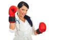 Happy doctor woman with boxing gloves Royalty Free Stock Photo