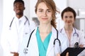 Happy doctor woman with medical staff at the hospital Royalty Free Stock Photo