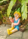 Happy doll in a garden